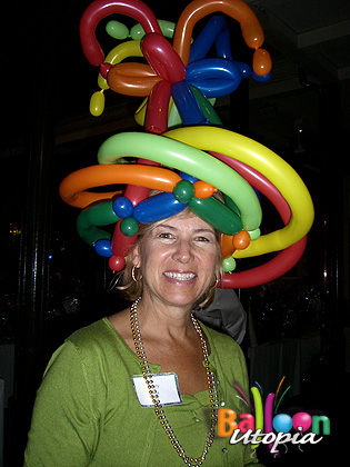 Who can help but smile while wearing a silly balloon hat?