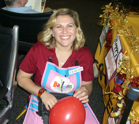 Sandi busy making balloons for corporate event