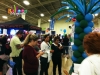 crowd gathers to opt in to marketing list at trade show booth