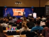 Grant Cardone on stage with Custom branded balloon wall